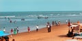 A seascape of the shrine velankanni beach with tour people. Royalty Free Stock Photo