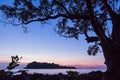 Seascape with small island at dusk twilight