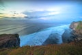 Seascape. Spectacular view from Uluwatu cliff in Bali. Sunset time. Blue hour. Ocean with motion foam waves. Waterscape for Royalty Free Stock Photo