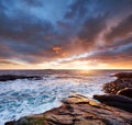 Seascape during storm and sunrise, Lofoten islands, Norway. Royalty Free Stock Photo