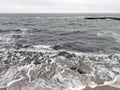 The city of Odessa. Ukraine. Coast near Fontana Street. Panorama of the stormy Black Sea in the feast of Epiphany.