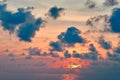 Seascape summer sunset at sea. Clouds in orange light Evening sun. Loneliness landscape. Royalty Free Stock Photo