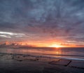 Seascape during the sunrise. Sky and reflections on the water in the summer. Sun rays during the sunrise. Nusa Penida, Bali, Indon Royalty Free Stock Photo