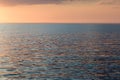 Seascape sunset. Blue and pink water ripples. Caspian Sea