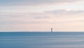 Seascape at sunset with Chauveau lighthouse. Rivedoux, Re Island, France Royalty Free Stock Photo