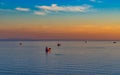 Seascape with tanker and ships on the background of the sea and coastline