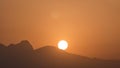 Seascape timelapse of high mountains over clear sunset sky in Antalya, Turkey Royalty Free Stock Photo