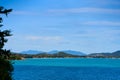 A seascape with turquoise water and islands in the distance. Winter vacation in Thailand Royalty Free Stock Photo