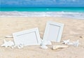 Seascape with two photo frames on the beach sand Royalty Free Stock Photo