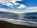 Seascape under Clouds in Bright Blue Sky Royalty Free Stock Photo