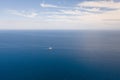 Seascape, view from above.Blue sea and sky with clouds