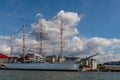 Seascape view of the historic famous tall ship Viking sailboat with inscidental people moored in Gothenburg harbor.