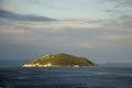 Seascape. View of the island on a sunny day. Horizontal shot.