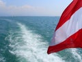 Seascape,View of the Lake called Bodensee from the excursion boat to the lake, with Austrian flag in the foreground