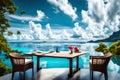 Seascape view under clouds with empty dining table. Romantic tropical getaway for two, couple concept. Luxury destination dining