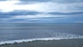 Seascape wave horizon cloudy and blue