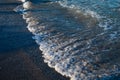 Seascape wave of the sea on the sandy beach