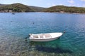 Seascape, white boat in a picturesque bay on the sea coast, Povlija, Croatia Royalty Free Stock Photo