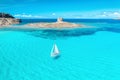 seascape with white sailing yacht in summer on sunny day aerial view. beach La Pelosa, Sardinia, Italy. Travel, hobby Royalty Free Stock Photo