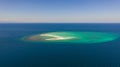 Seascape, white sand island..Atoll near the island of Camiguin, Philippines, aerial view