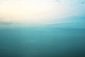 Seascape with a wide horizon of sky and sea. Skyline. The turquoise surface of the sea or ocean. Sunrise or sunset over the sea Royalty Free Stock Photo