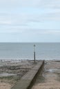 A seascape with a windfarm on the horizon in Llandudno north Wales Royalty Free Stock Photo