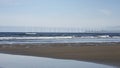 Seascape  Windmill farm in the ocean,  Row of floating wind turbines, LAndscape offshore wind turbines in Middlebrough, United Royalty Free Stock Photo