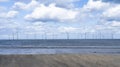 Seascape  Windmill farm in the ocean,  Row of floating wind turbines, Landscape offshore wind turbines in Middlebrough, United Royalty Free Stock Photo