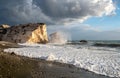 Seascape with windy waves at the rocky coastal area of the Rock of Aphrodite in Paphos, Cyprus