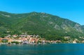 seascapes, a view of the Bay of Kotor during a cruise on a ship in Montenegro, a bright sunny day, mountains and small towns on