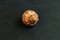 A seashell on a black background of Turbo jourdani. Royalty Free Stock Photo
