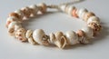 Seashell Necklace on White Background Royalty Free Stock Photo