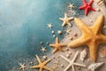 Seashell, starfish and beach sand on blue background. Summer holiday concept. Top view and flat lay Royalty Free Stock Photo