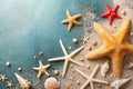 Seashell, starfish and beach sand on blue background. Summer holiday concept. Top view and flat lay Royalty Free Stock Photo