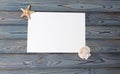 Seashell, starfish on the corner of a white sheet of paper Royalty Free Stock Photo