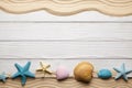 Seashells, beach sand and wooden planks Royalty Free Stock Photo