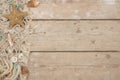 Seashells, fishing net and starfish on a scaffolding wooden background