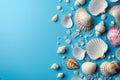 Seashells, pebbles, mockup on blue background. Blank, top view, still life, flat lay. Sea vacation travel concept Royalty Free Stock Photo