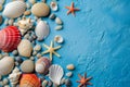 Seashells, pebbles, mockup on blue background. Blank, top view, still life, flat lay. Sea vacation travel concept Royalty Free Stock Photo