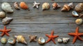 Seashells and starfish frame on weathered wood Royalty Free Stock Photo