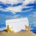 Seashells and starfish with open envelope with blank letter Royalty Free Stock Photo