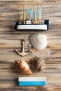 Seashells, wooden anchor and toy boat