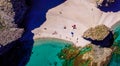 Seashore, coastline, scenic view of people at unspoiled beach in Almeria, called Playa de los Muertos,