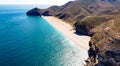 Seashore, coastline, scenic view of people at unspoiled beach in Almeria, called Playa de los Muertos, Royalty Free Stock Photo