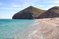 Seashore, coastline, scenic view of people at unspoiled beach in Almeria Royalty Free Stock Photo