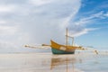 Seashore low tide with old boat front view Royalty Free Stock Photo