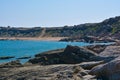 Seashore, rocks, blue water