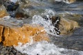 On the seashore the rocks are washed by waves Royalty Free Stock Photo