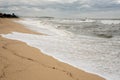 A seashore scene in which high waves come with cloudy weather and strong winds. South Korea Donghae the sea.