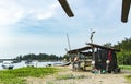 Seashore scenery at Terengganu, Malaysia. Dirty white fish net b